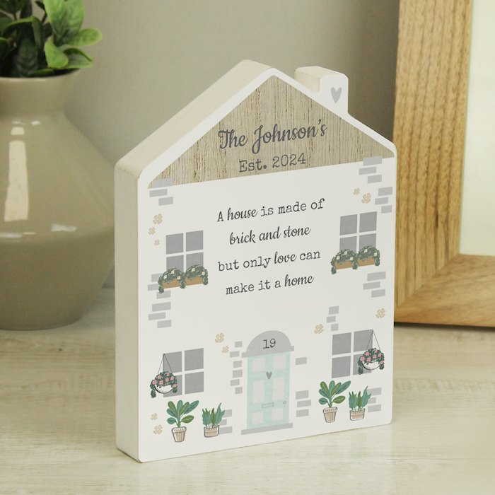 Personalised Love Makes A Home Wooden House Ornament